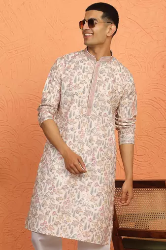 beige kurta featuring intricate floral patterns and mandarin collar