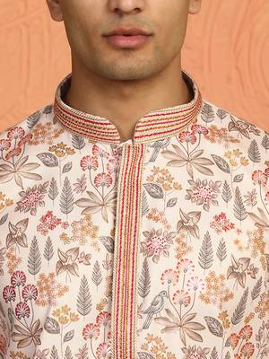 beige kurta featuring intricate floral patterns and mandarin collar 2