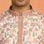 beige kurta featuring intricate floral patterns and mandarin collar