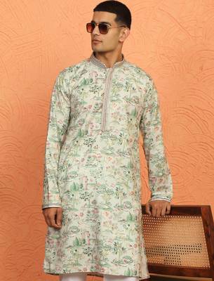 green kurta featuring intricate floral patterns and mandarin collar 1