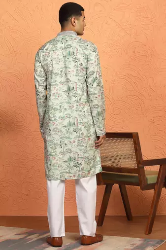 green kurta featuring intricate floral patterns and mandarin collar