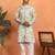 green kurta featuring intricate floral patterns and mandarin collar