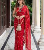 Red woven design zari leheriya saree with unstiched blouse