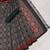 Geometric printed tissue bandhani saree with blouse piece