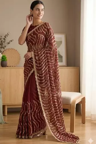 Embellished sequinned heavy work leheriya saree