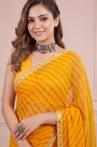 Yellow sequinned leheriya saree with unstiched blouse