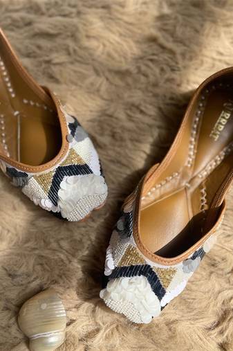White multicolor pearls and cutdana embellished jutti