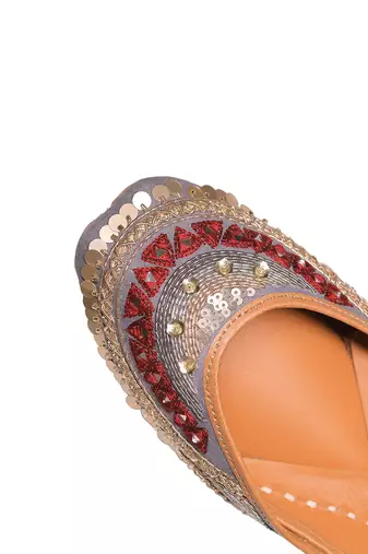 Grey red and gold tone embellished jutti