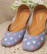 Blue denim juttis with white and pink thread embroidery