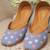 Blue denim juttis with white and pink thread embroidery