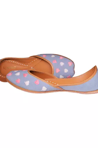 Blue denim juttis with white and pink thread embroidery
