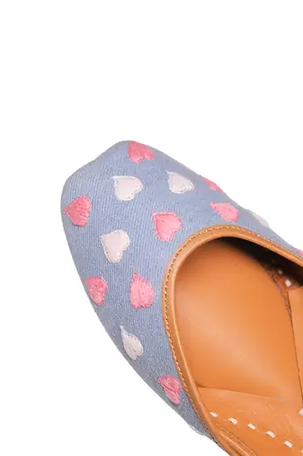 Blue denim juttis with white and pink thread embroidery