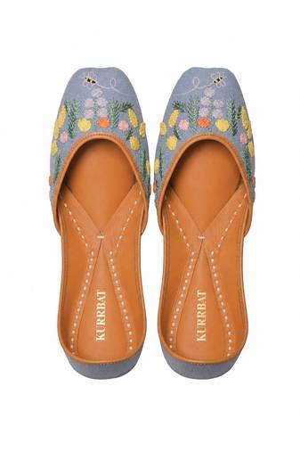 Blue denim juttis with quirk of floral embroidery