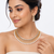 Certified natural freshwater pearls jewellery gold-toned kundan choker necklace and earrings set with pearl drops.