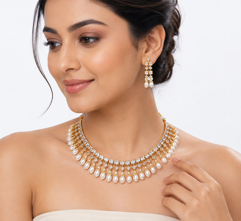 Certified natural freshwater pearls jewellery gold-toned kundan choker necklace and earrings set with pearl drops.