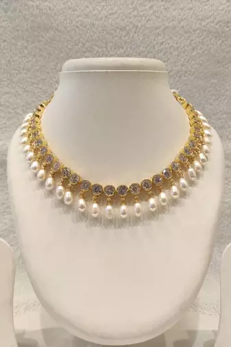 Certified natural freshwater pearls jewellery gold-tone finish, dangling pearl drops, matching earrings, bridal wear.