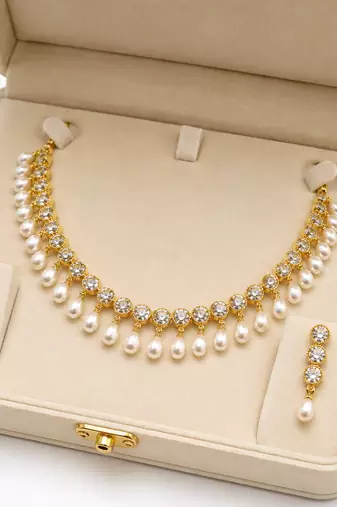 Certified natural freshwater pearls jewellery gold-tone finish, dangling pearl drops, matching earrings, bridal wear.