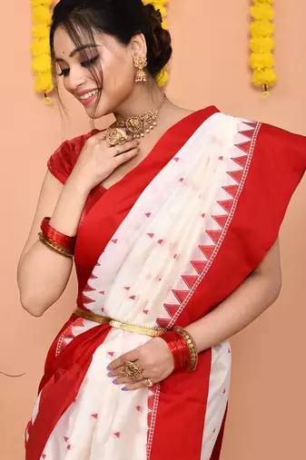 white gadowal silk blend saree with running blouse piece with red border