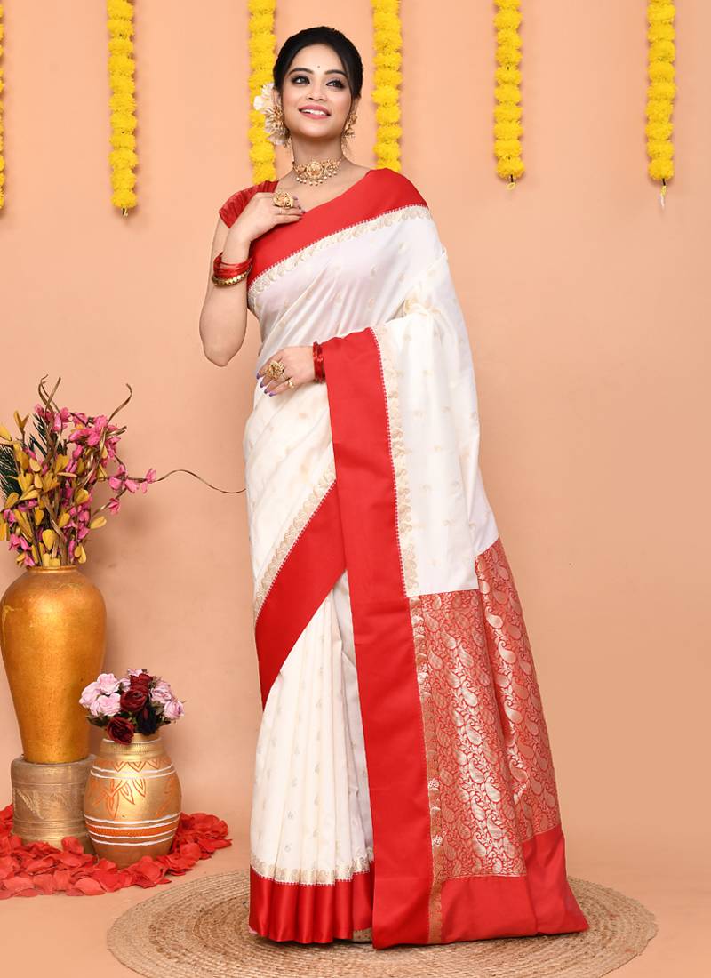 white gadowal silk blend saree with running blouse piece with red border