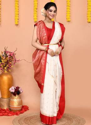 white gadowal silk blend saree with running blouse piece with red border 4