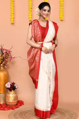 white gadowal silk blend saree with running blouse piece with red border