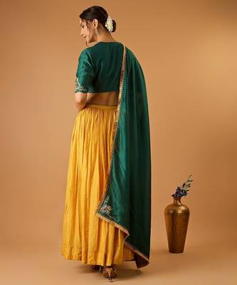 Green embroidered blouse with yellow flared lehenga with embroidered dupatta 2