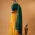 Green embroidered blouse with yellow flared lehenga with embroidered dupatta
