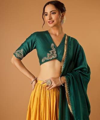 Green embroidered blouse with yellow flared lehenga with embroidered dupatta 3