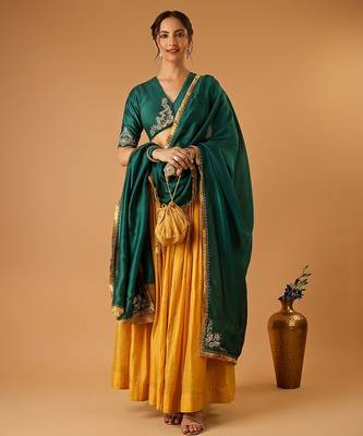 Green embroidered blouse with yellow flared lehenga with embroidered dupatta 4