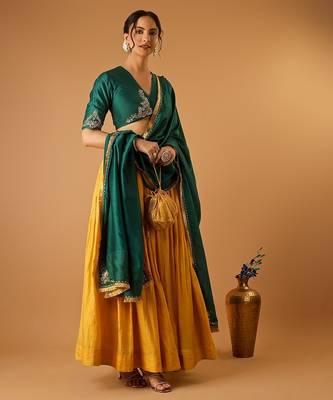 Green embroidered blouse with yellow flared lehenga with embroidered dupatta 5