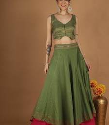 Olive green chanderi layered skirt set with hot pink katan silk dupatta