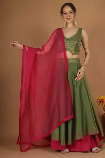 Olive green chanderi layered skirt set with hot pink katan silk dupatta