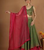 Olive green chanderi layered skirt set with hot pink katan silk dupatta