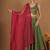 Olive green chanderi layered skirt set with hot pink katan silk dupatta