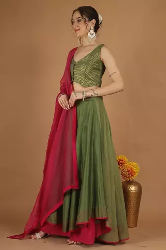 Olive green chanderi layered skirt set with hot pink katan silk dupatta