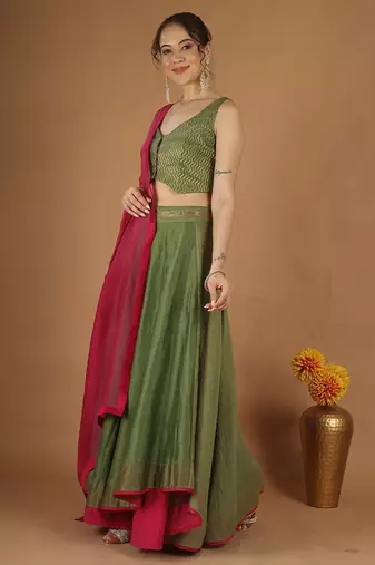 Olive green chanderi layered skirt set with hot pink katan silk dupatta