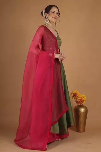 Olive green chanderi layered skirt set with hot pink katan silk dupatta