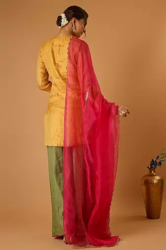 Zigzag zari weave yellow short kurta with green palazzo and hot pink katan silk dupatta