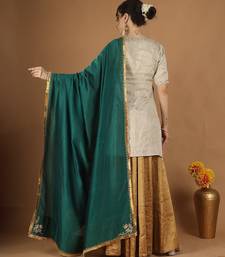 Silver zari kurta & gold zari sharara set with green embroidered dupatta