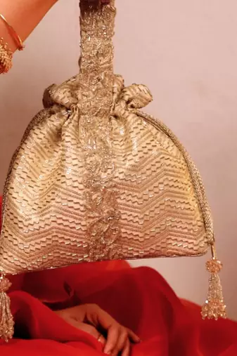 Gold silk woven potli bag