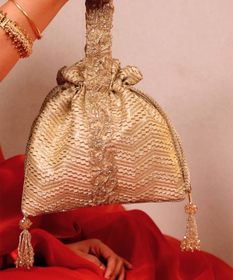 Gold silk woven potli bag