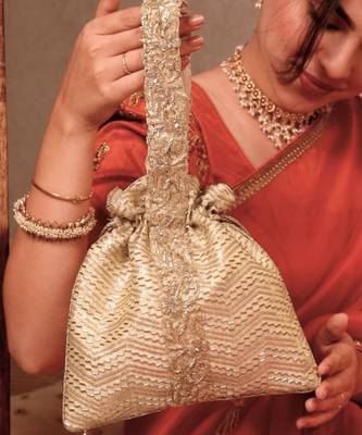 Gold silk woven potli bag 3