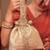 Gold silk woven potli bag