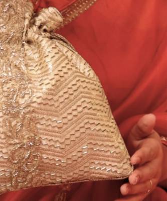 Gold silk woven potli bag 5