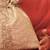 Gold silk woven potli bag