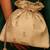Beige georgette beaded satin potli bag