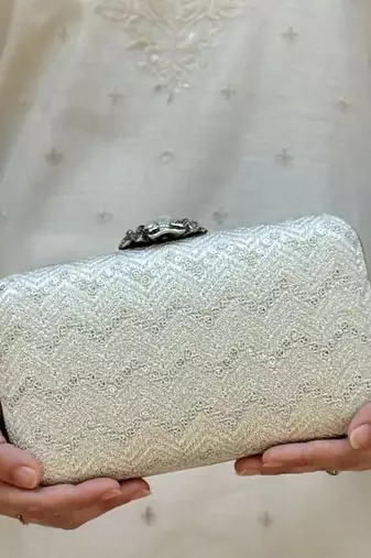 Off white georgette metallic clutch