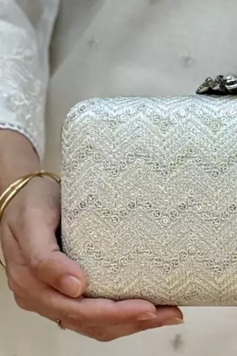 Off white georgette metallic clutch