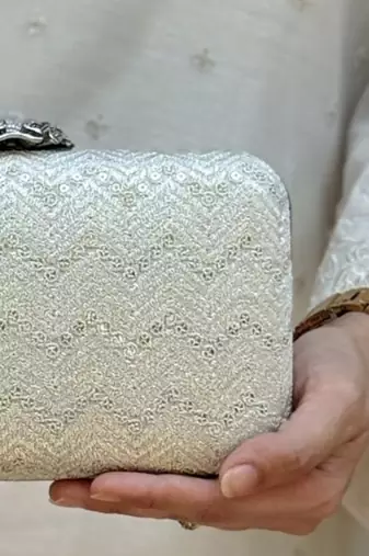Off white georgette metallic clutch