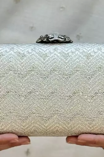 Off white georgette metallic clutch
